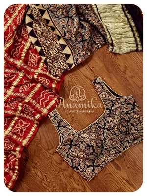 Maroonish Red Gharchola saree with Ajrak Pallu