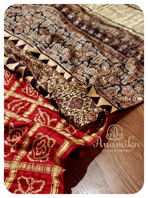 Maroonish Red Gharchola saree with Ajrak Pallu