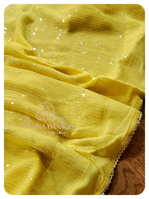Yellow sequins georgette saree with heavy work blouse
