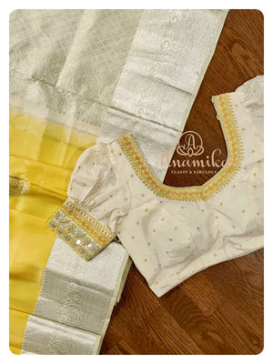 Yellow/off white kanchi silk saree with puff sleeves blouse