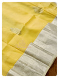 Yellow/off white kanchi silk saree with puff sleeves blouse