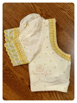 Yellow/off white kanchi silk saree with puff sleeves blouse