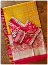 Orangish Yellow Pattu saree with red border