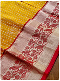 Orangish Yellow Pattu saree with red border