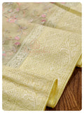 Pastel Yellow organza saree with pink pearl work blouse