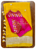 Yellow banarasi chiffon saree with pink blouse